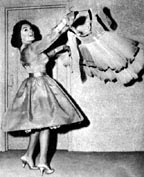 Connie Francis holding a dress