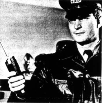 Police Officer poses with HT-220