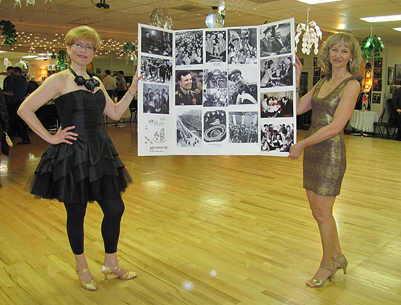 ballroom dancers with Yuri poster at a dance studio